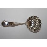 A HALLMARKED SILVER SIFTER SPOON