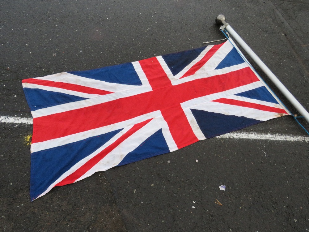 A 16FT ALUMINIUM FLAG POLE WITH A STITCHED, COTTON UNION JACK FLAG