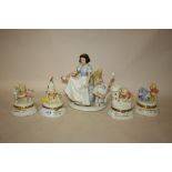FOUR WINNIE THE POOH TRINKET BOXES BY LENOX, TOGETHER WITH A LENNOX SNOW WHITE AND THE SEVEN DWARVES