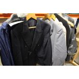 A COLLECTION OF GENTS CLOTHING TO INCLUDE A BUSH OVER COAT, SUITS ETC