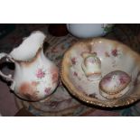 A VINTAGE FLORAL JUG AND BOWL SET