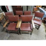 A SET OF SIX OAK STUDDED DINING CHAIRS (4+2)