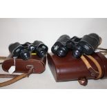 A PAIR OF CASED CARL ZEISS JENA 10 X 50 BINOCULARS TOGETHER WITH A PAIR OF 8 X 30 BINOCULARS