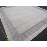 A LARGE CHINESE WOOLLEN RUG 314 X 314 CM