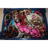 A BOX OF COSTUME JEWELLERY