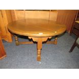 A LARGE OAK CIRCULAR COFFEE TABLE DIA. 99 CM