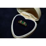 A HALLMARKED 18CT GOLD EMERALD AND DIAMOND LADIES DRESS RING - SIZE P