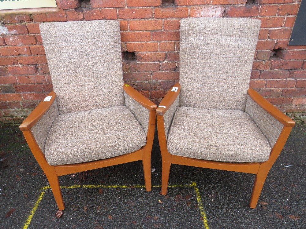 A PAIR OF RETRO PARKER KNOLL ARMCHAIRS