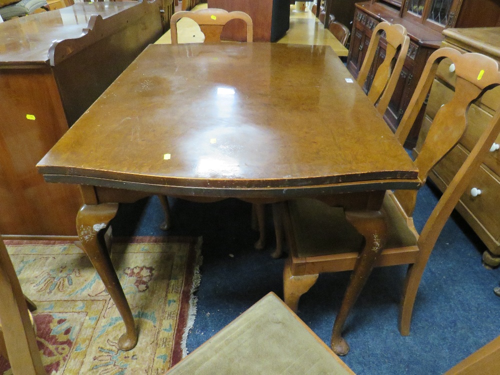 A RETRO WALNUT DRAWLEAF DINING TABLE, SIX CHAIRS AND A SIDEBOARD - Image 2 of 4