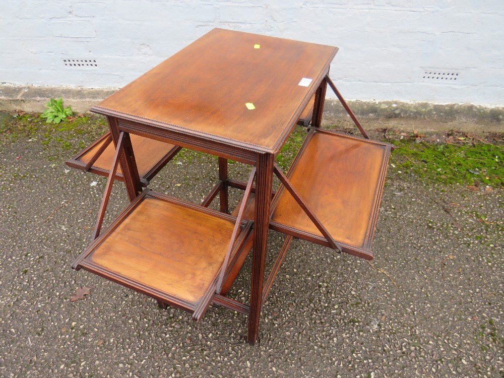 AN ARTS AND CRAFTS STYLE MAHOGANY TABLE WITH FOLD OUT SHELVES H-73 CM - Image 2 of 4
