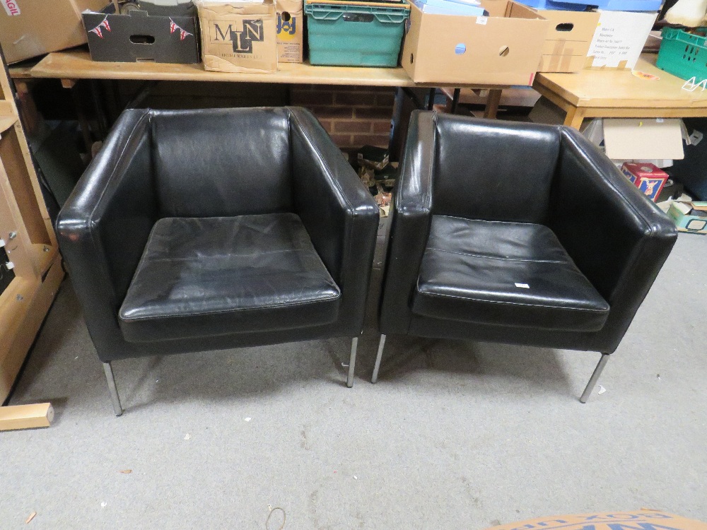 A PAIR OF MODERN BLACK SQUARE ARMCHAIRS