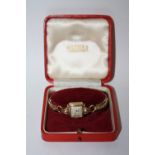 A LADIES 9 CT GOLD ROMA WRISTWATCH IN ORIGINAL BOX