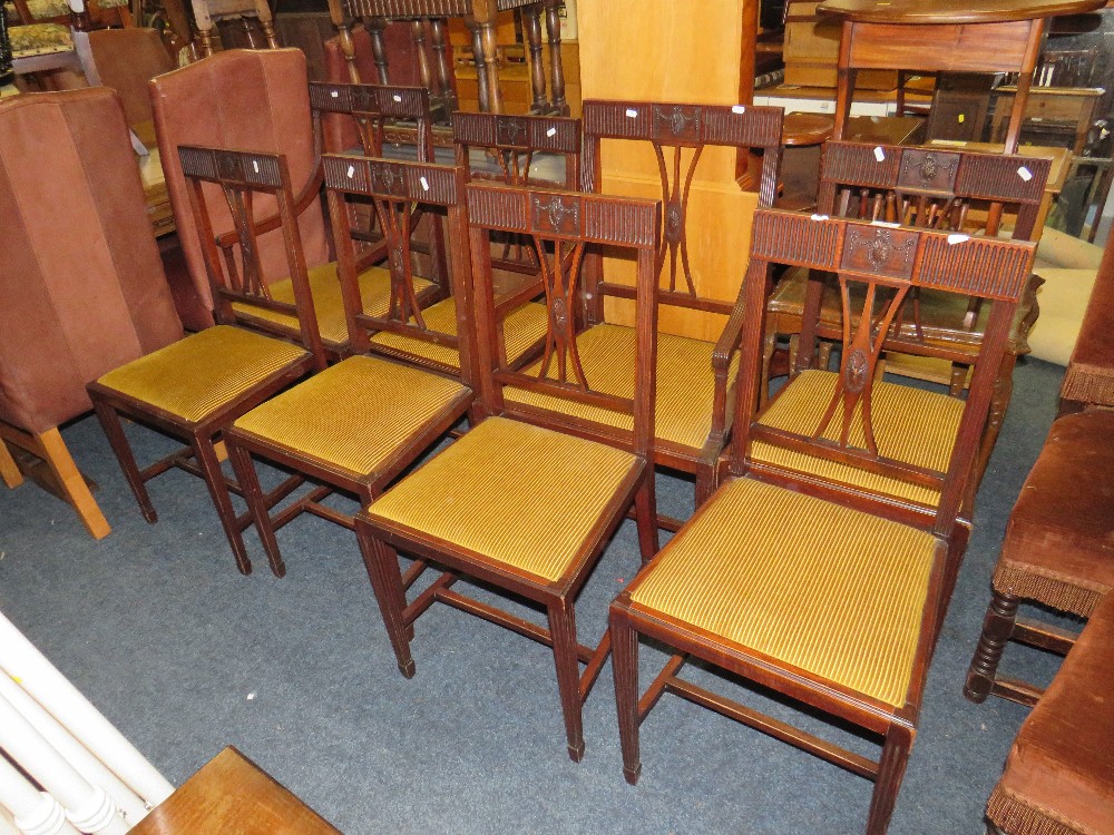 A SET OF EIGHT MAHOGANY SHERATON STYLE DINING CHAIRS