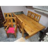 A LARGE AND IMPRESSIVE GOLDEN OAK REFECTORY TABLE AND EIGHT GOTHIC STYLE HIGH BACK CHAIRS - TABLE