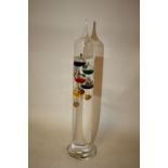 A GLASS GALILEO THERMOMETER, HEIGHT 34 CM