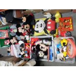 A LARGE QUANTITY OF MICKEY MOUSE RELATED COLLECTABLES TO INCLUDE SOFT TOYS