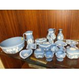 A QUANTITY OF WEDGWOOD JASPERWARE TO INCLUDE A FRUIT BOWL, SQUAD CANDLESTICK, JUGS ETC. (18)