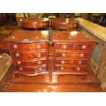 TWO SMALL REPRODUCTION MAHOGANY CHEST OF DRAWERS INCLUDING A SERPENTINE EXAMPLE
