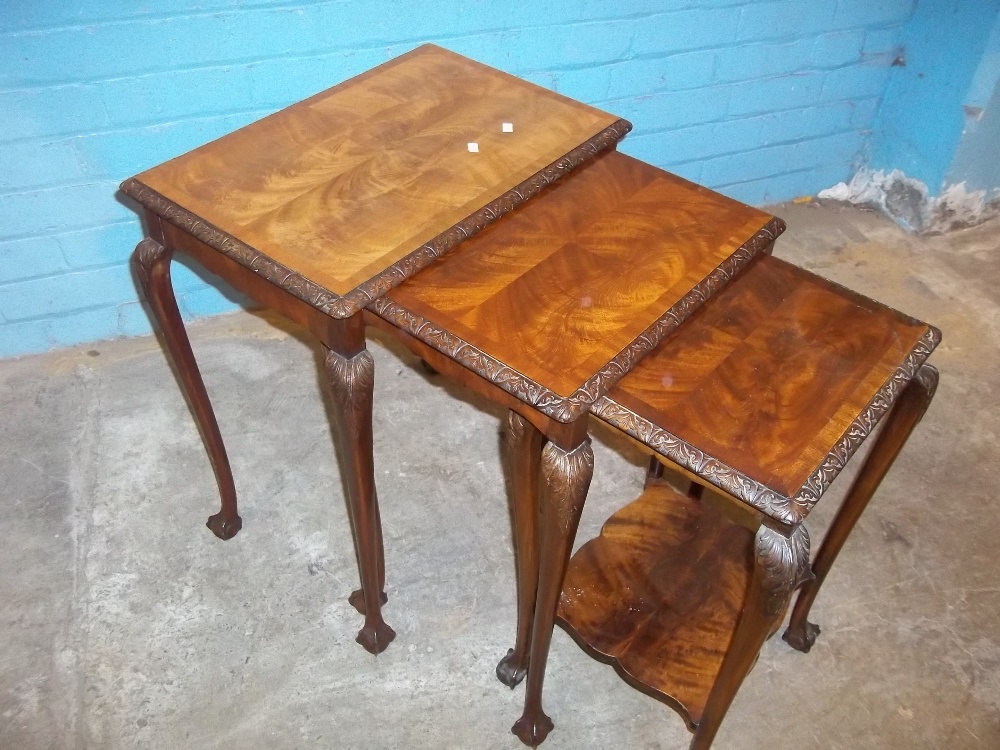 AN ANTIQUE INLAID NEST OF THREE TABLES WITH CABRIOLE CLAW AND BALL LEGS