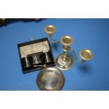 A HALLMARKED SILVER SMALL DISH, HALLMARKED CONDIMENT SET IN CASE AND A PLATED CANDLE HOLDER