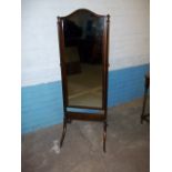 AN ANTIQUE SWIVEL DRESSING MIRROR FULL LENGTH ON WHEELS