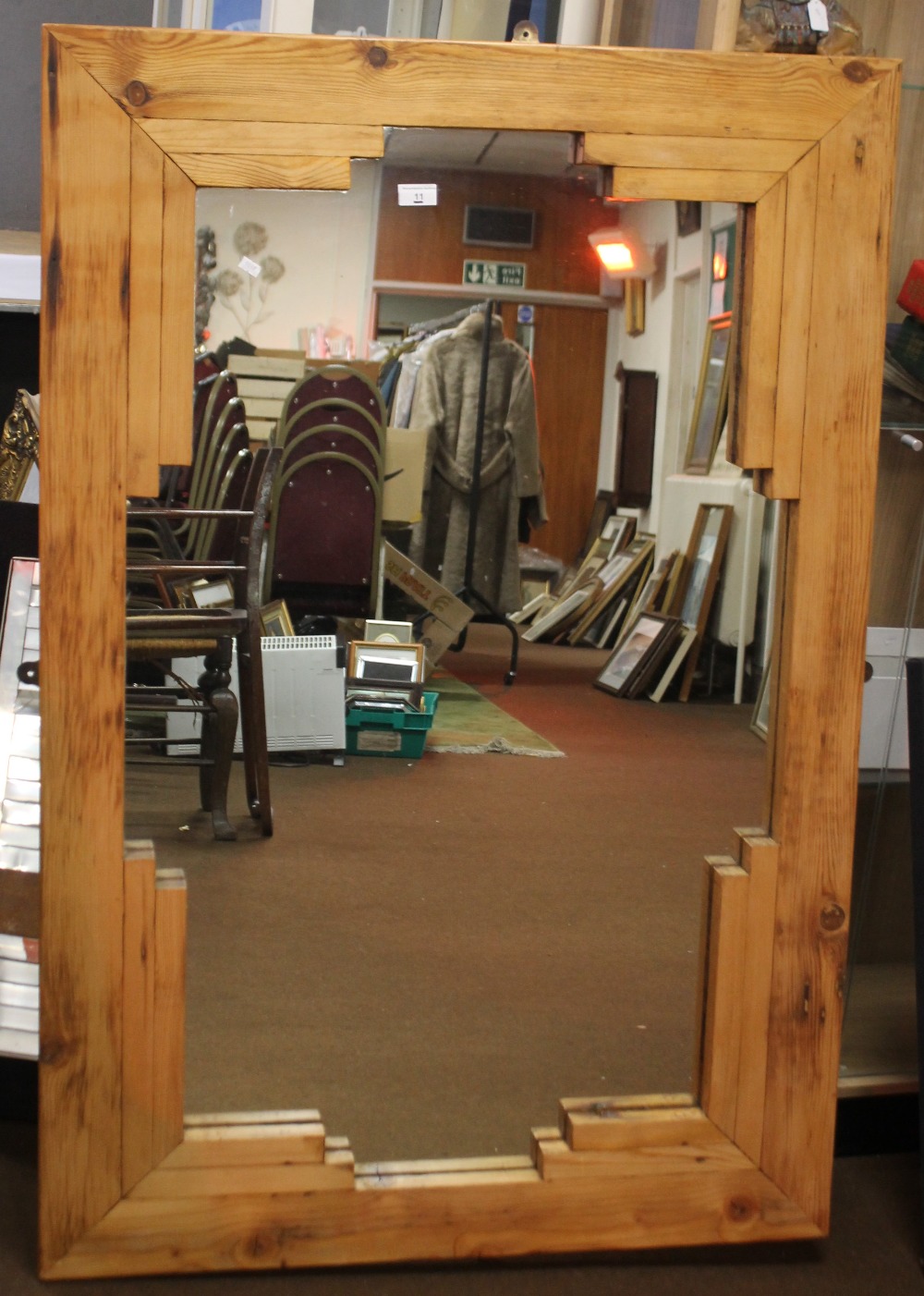 A PINE FRAMED MIRROR 133.5 X 89 CM