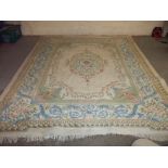 AN ORIENTAL CHINESE RUG, W 270 CM X L 370 CM