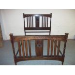 AN ANTIQUE OAK VONO DOUBLE BEDSTEAD FRAME