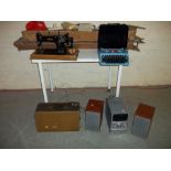 A VINTAGE JONES HAND SEWING MACHINE, A KNITTING MACHINE, A BROTHER PORTABLE TYPEWRITER AND A SONY