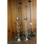 TWO PAIRS OF METAL CANDLESTICKS