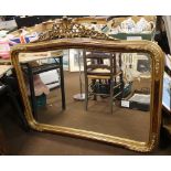 A LARGE REPRODUCTION GILT FRAMED MIRROR