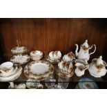 A QUANTITY OF ROYAL ALBERT "OLD COUNTRY ROSES" TEAWARE COMPRISING TEAPOT, COFFEE POT AND CAKE