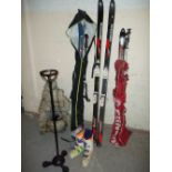 THREE SETS OF SKIS AND A GARDEN WATER FEATURE