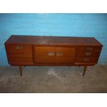 A RETRO TEAK TYPE SIDEBOARD