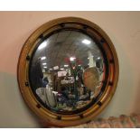 A CIRCULAR FRAMED MIRROR DIAMETER 51 CM