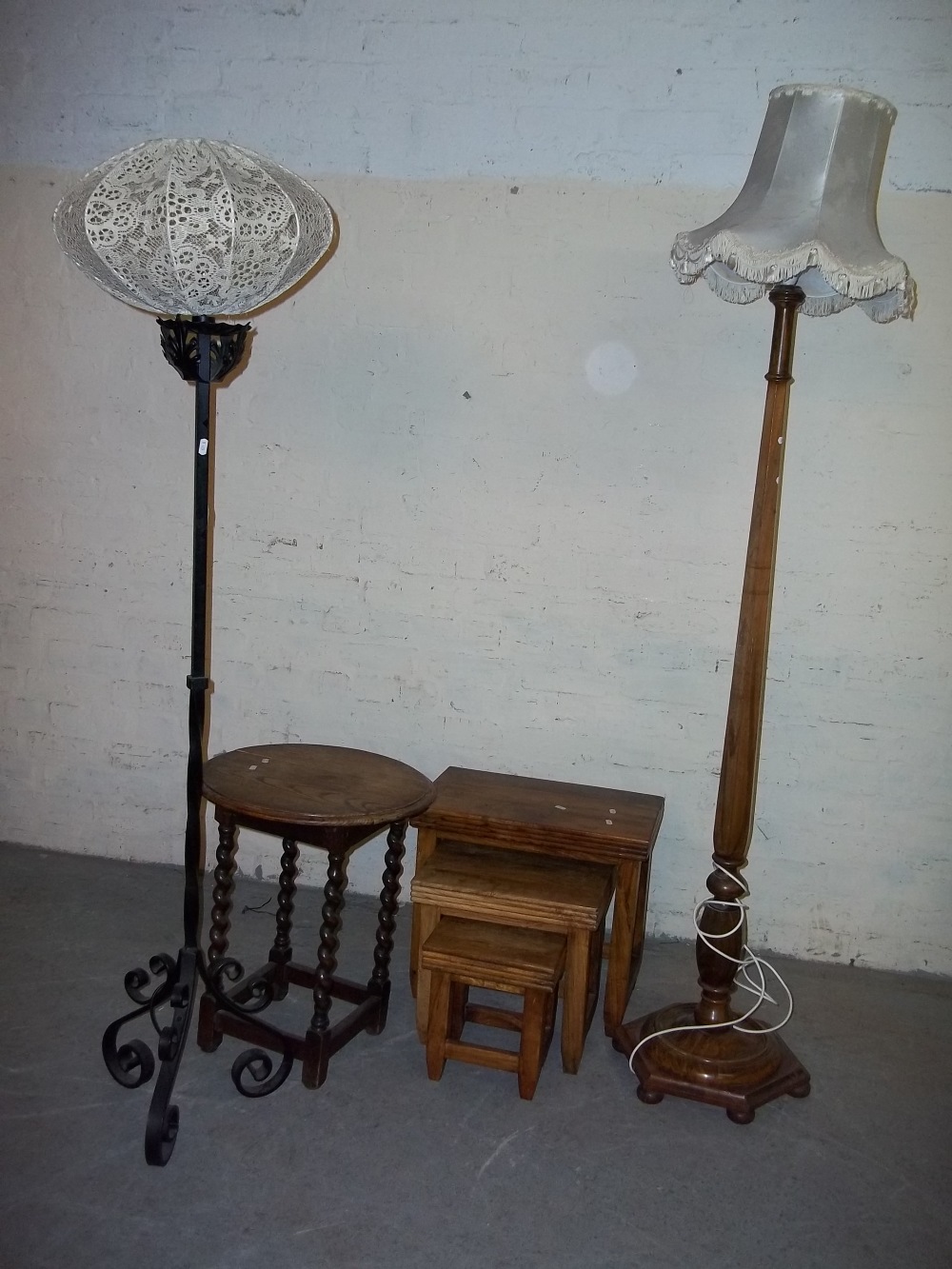 A NEST OF THREE TABLES, AN ANTIQUE BARLEY TWIST OAK SIDE TABLE AND TWO FLOOR STANDING STANDARD LAMPS