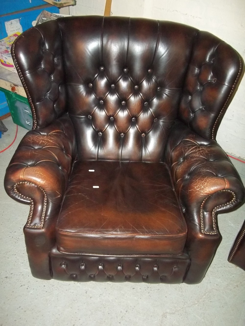 A BROWN LEATHER THREE SEATER CHESTERFIELD SOFA AND WING BACKED CHAIR (TWO PIECE SUITE) - Image 3 of 3