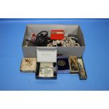 A BOX OF ASSORTED COSTUME JEWELLERY