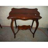 AN ANTIQUE OCCASIONAL HALL TABLE