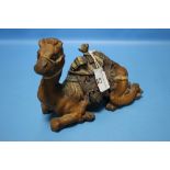 A COLD PAINTED SPELTER CAMEL INKWELL