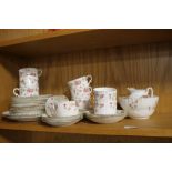 A VICTORIAN ROSE PATTERN TEA SET, SOME PIECES A/F