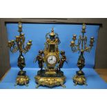 A REPRODUCTION FRENCH STYLE CLOCK GARNITURE IN GILT METAL AND GREEN MARBLE