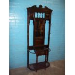 A MAHOGANY EDWARDIAN COAT HALL STAND