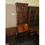 A REPRODUCTION MAHOGANY SLIM BUREAU BOOKCASE H-194 W-52 CM