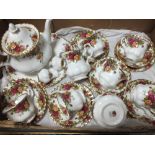 A TRAY OF ROYAL ALBERT OLD COUNTRY ROSES, TO INCLUDE TEA POT, TRIOS, PEPPERETTES ETC.