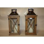 A PAIR OF DECORATIVE MODERN CANDLE LANTERNS, HEIGHT 45 CM