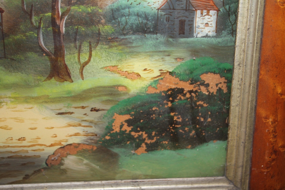 A SATINWOOD FRAMED REVERSE PAINTING ON GLASS DEPICTING A CHURCH BESIDE A RIVER A/F - SIZE 60CM X - Image 3 of 4