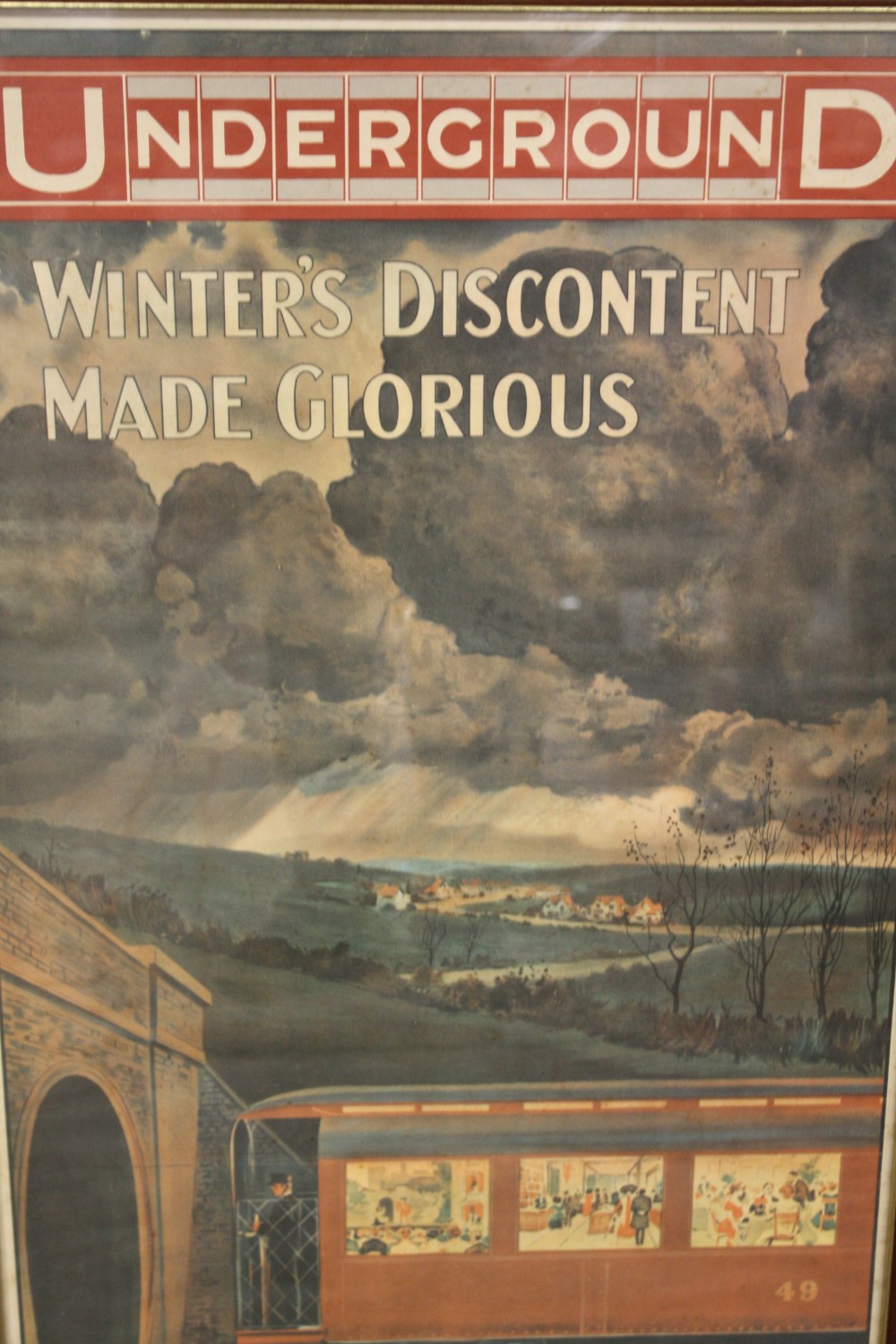 A REPRODUCTION FRAMED AND GLAZED LONDON RAILWAY INTEREST PRINT ENTITLED 'UNDERGROUND WINTERS - Image 2 of 4