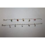 TWO MODERN SILVER CHARM BRACELETS, APPROX WEIGHT 9.6 G
