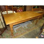 A LARGE PINE FARMHOUSE STYLE KITCHEN TABLE H-78 L-183 CM